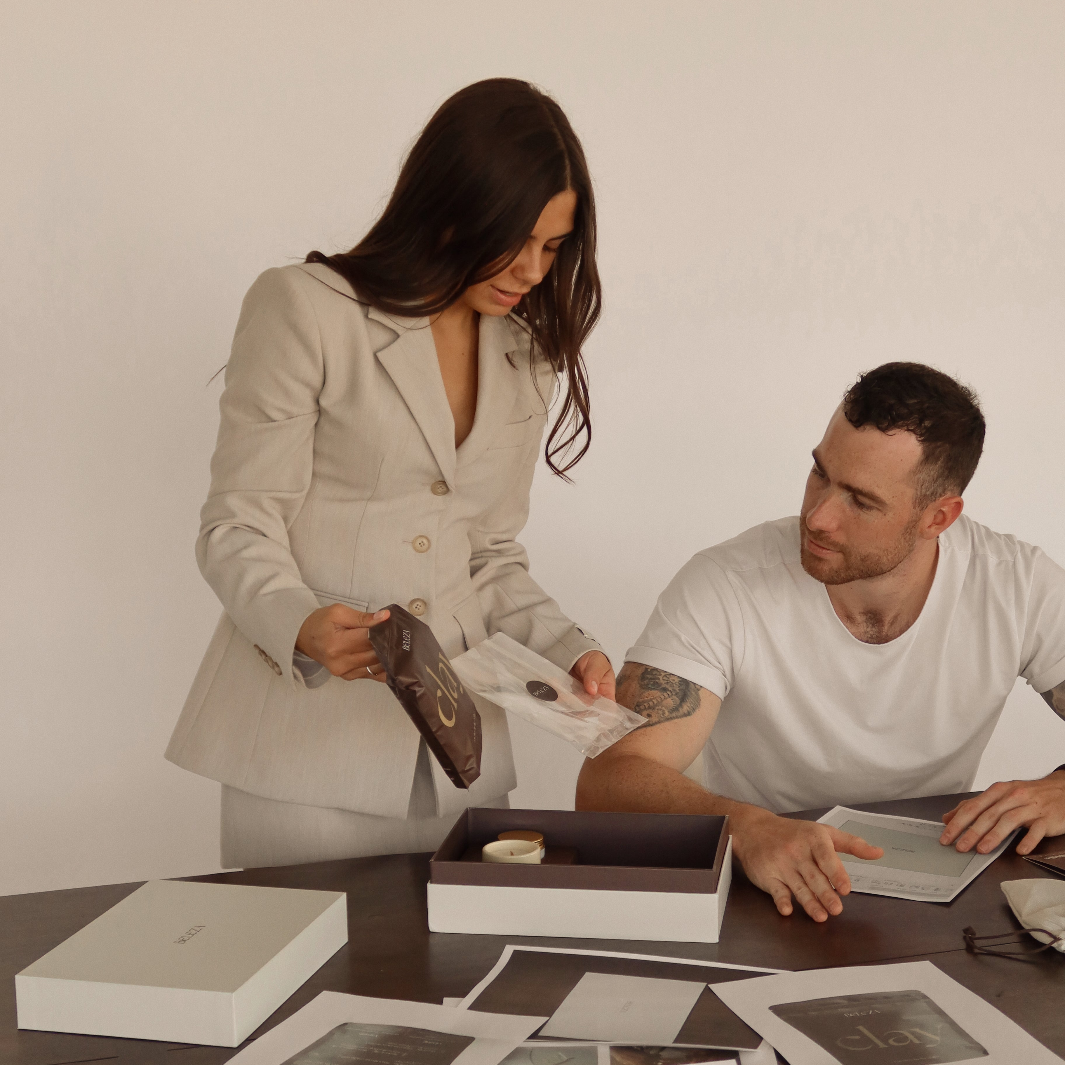 Beleza founders (Calista and Josh) planning the kit product and sampling components.